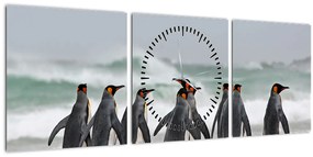 Obraz tučniakov pri oceáne (s hodinami) (90x30 cm)