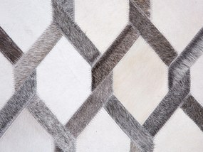 Kožený koberec 140 x 200 cm sivá/béžová AYDIN Beliani