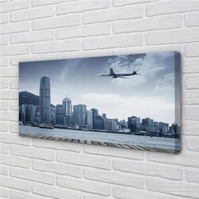 Obraz canvas Lietadiel mraky město 120x60 cm