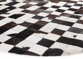 Okrúhly kožený koberec ⌀ 140 cm  čierna/biela BERGAMA Beliani