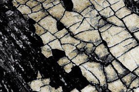 Moderný koberec DE LUXE 2079 Štrukturálny zlatý / sivý