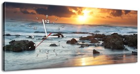 Gario Obraz s hodinami Západ slnka nad oceánom Rozmery: 100 x 40 cm