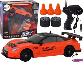 LEAN Toys Športové autíčko s diaľkovým ovládaním R/C v mierke 1:24, oranžové, s vymeniteľnými kolesami