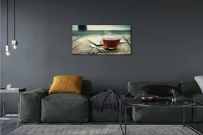 Obraz canvas Ohrievať lyžičku čaju 140x70 cm
