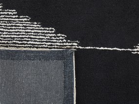 Bavlnený koberec 80 x 150 cm čierna/biela BATHINDA Beliani
