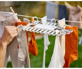 Béžový závesný sušiak na bielizeň Petal – Joseph Joseph