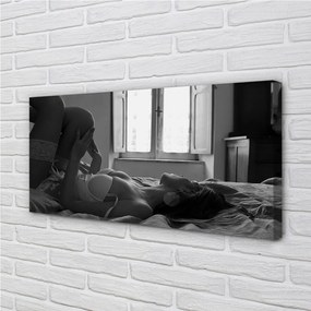 Obraz canvas Ležiaci žena na priezoru 140x70 cm