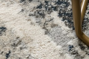 Koberec TULS 51328 s abstraktným vzorom, slonovinová sivá