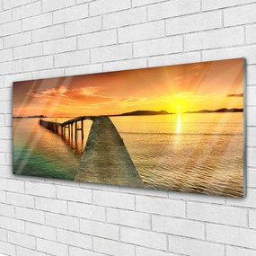 Obraz plexi More slnko most krajina 125x50 cm