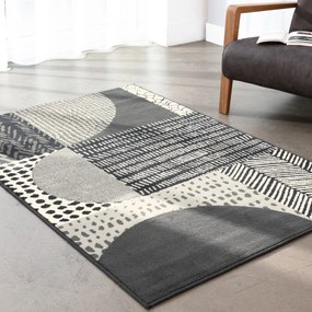 Dekoratívny koberec s geometrickým vzorom 3 veľkosti: 60 x 110 cm, 80 x 150 cm a 120 x 170 cm.