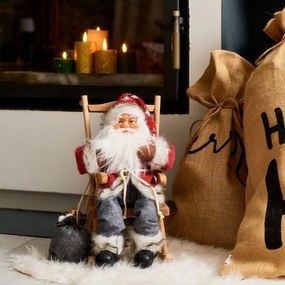 Vianočný škriatok CLAUSE Mikuláš na hojdacom kresle 713972