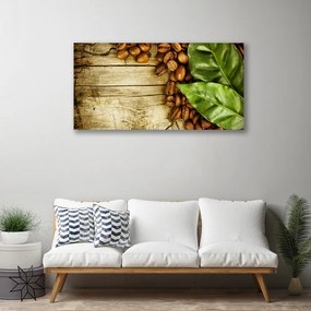 Obraz na plátne Zrnká káva listy kuchyňa 140x70 cm