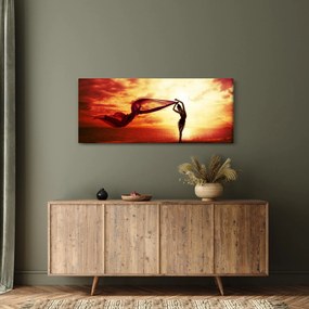 Obraz - Silueta ženy v západu slnka (120x50 cm)