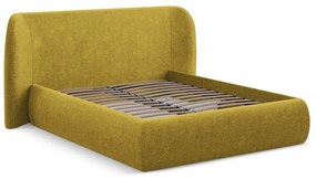 Čalúnená dvojlôžková posteľ s úložným priestorom s roštom 180x200 cm v horčicovej farbe Hauke – Makamii