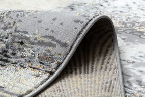 Moderný koberec DE LUXE 633 Abstrakcia - Štrukturálny krém / zlatý