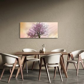 Obraz rozkvitnutého stromu na vrchole kopca (120x50 cm)