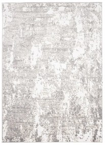 Dizajnový koberec s abstraktným vzorom v krémovej farbe Šírka: 80 cm | Dĺžka: 150 cm