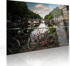 Sklenený obraz bicykla v meste (70x50 cm)