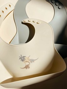 Konges Sløjd Silikónový podbradník s vreckom Dino – set 2 ks