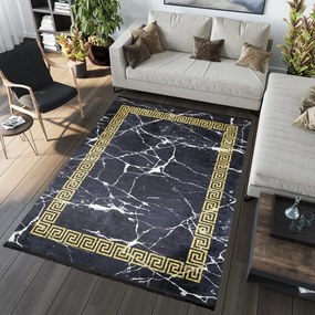 Čierny trendový koberec so zlatým geometrickým vzorom Šírka: 80 cm | Dĺžka: 150 cm