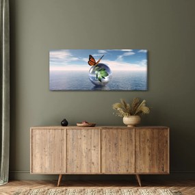 Obraz motýľa na sklenenej guli (120x50 cm)