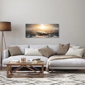 Obraz - Lietadlo v oblakoch (120x50 cm)
