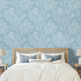 Fototapeta biele vetvičky na modrom pozadí