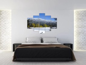 Obraz - zasnežené hory v zime (150x105 cm)