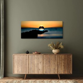 Obraz sklenenej gule v dlani (120x50 cm)