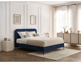 Tmavomodrá čalúnená dvojlôžková posteľ s roštom 140x190 cm Prune – Bobochic Paris