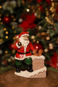 Klasik vianočná figúrka Mikuláš pri komíne 19cm