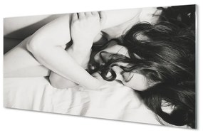 Obraz na skle spiace ženu 140x70 cm