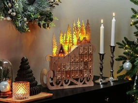 LED dekorácia sane a adventný kalendár svetlé drevo IMPALA Beliani