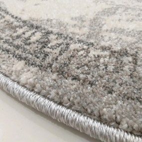 Štýlový sivý okrúhly koberec so vzorom mandaly