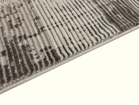 DC Koberec Oman 637 tmavá vizion zlatá Rozmer: 140×190 cm