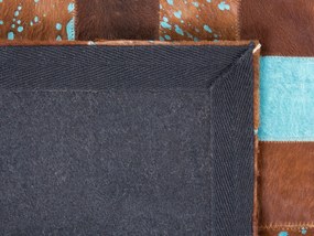 Kožený koberec 140 x 200 cm hnedá/modrá ALIAGA Beliani