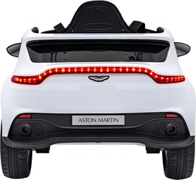 Ramiz Aston Martin DBX na batérie pre deti Biely + diaľkové ovládanie + EVA + pásy + pomalý štart + LED zvuk