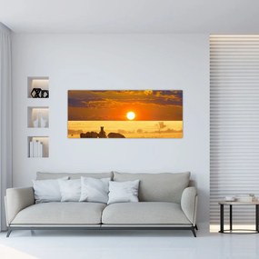 Obraz - Zebry so západom slnka (120x50 cm)