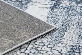 Moderný koberec DE LUXE 528 Abstrakcia - Štrukturálny krém  / tmavomodrý