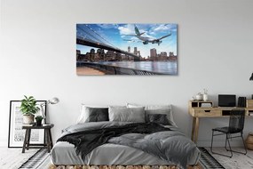 Obraz plexi Lietadiel mraky město 140x70 cm