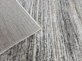 DC Koberec Oman 412 tmavá vizion zlatá Rozmer: 140×190 cm