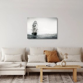 Sklenený obraz - Loď plávajúca po oceáne (70x50 cm)