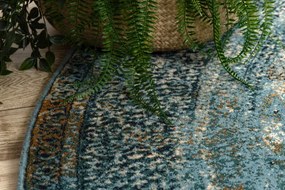 Koberec OMEGA MAMLUK tmavomodrý / hnedý kruh