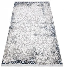 Moderný koberec REBEC 51172A strapce, krémovo/ tmavo modrý